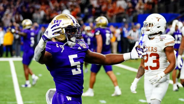 Washington Huskies linebacker Edefuan Ulofoshio (5) celebrates after the Washington Huskies beat the Texas Longhorns in the 2024 Sugar Bowl college football playoff semifinal game at Caesars Superdome.